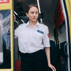 Lena at the back of an ambulance